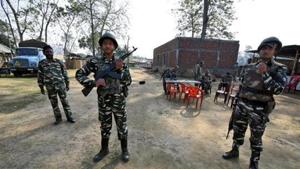 File photo of CROF personnel standing guard at a temporary camp ahead of the publication of the first draft of the National Register of Citizens (NRC) in the Juria village of Nagaon district in Assam on December 28.(REUTERS) File photo of CROF personnel standing guard at a temporary camp ahead of the publication of the first draft of the National Register of Citizens (NRC) in the Juria village of Nagaon district in Assam on December 28.(REUTERS)