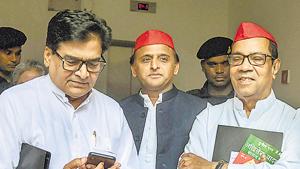 Lucknow: Samajwadi Party President Akhilesh Yadav flanked by party's general secretary Ram Gopal Yadav (L) and party vice-president Kiranmoy Nanda at the National Executive meeting at Lucknow, July 28(PTI) Lucknow: Samajwadi Party President Akhilesh Yadav flanked by party's general secretary Ram Gopal Yadav (L) and party vice-president Kiranmoy Nanda at the National Executive meeting at Lucknow, July 28(PTI)