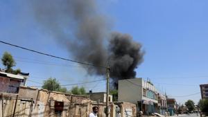 Smoke rises from an area where explosions and gunshots were heard, in Jalalabad city, Afghanistan, on Tuesday.(Reuters photo) Smoke rises from an area where explosions and gunshots were heard, in Jalalabad city, Afghanistan, on Tuesday.(Reuters photo)