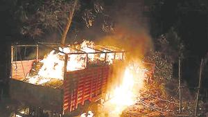 Truck set ablaze by kanwariyas after a 12-year-old boy was hit to death by the speeding vehicle at Bahadrabad on Kanwar stretch in Haridwar.(RAMESHWAR GAUR/HT PHOTO)