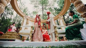 The wedding outfit can also be matched with the theme of the season, where you can opt for colours like peach, subtle gold and hues of pink.(Shutterstock) The wedding outfit can also be matched with the theme of the season, where you can opt for colours like peach, subtle gold and hues of pink.(Shutterstock)