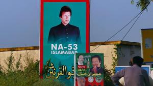 A portrait of Imran Khan, head of the Pakistan Tehreek-e-Insaf party, is on display near Khan's residence, in Islamabad, Pakistan.(AP File Photo) A portrait of Imran Khan, head of the Pakistan Tehreek-e-Insaf party, is on display near Khan's residence, in Islamabad, Pakistan.(AP File Photo)