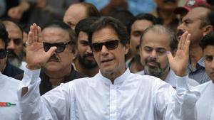 Pakistan's cricketer-turned politician Imran Khan speaks to the media after casting his vote at a polling station during the general election in Islamabad on July 25.(AFP) Pakistan's cricketer-turned politician Imran Khan speaks to the media after casting his vote at a polling station during the general election in Islamabad on July 25.(AFP)