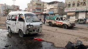 People walk past damaged cars at the entrance of Al-Thawra hospital after an air strike in the Red Sea town of Hodeida on August 2.(AFP File Photo) People walk past damaged cars at the entrance of Al-Thawra hospital after an air strike in the Red Sea town of Hodeida on August 2.(AFP File Photo)
