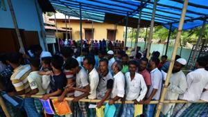 People wait in queue to check their names on the draft list at the National Register of Citizens (NRC) centre at a village in Nagaon district, Assam.(REUTERS Photo) People wait in queue to check their names on the draft list at the National Register of Citizens (NRC) centre at a village in Nagaon district, Assam.(REUTERS Photo)