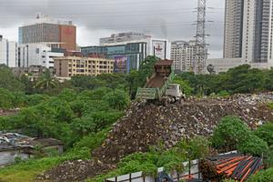 A garbage pile outside Ram Mandir Railway station in Mumbai in August, 2018.(HT Photo) A garbage pile outside Ram Mandir Railway station in Mumbai in August, 2018.(HT Photo)