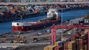 A cargo ships sits docked at the Viau terminal in the Port of Montreal in Montreal, Quebec, Canada.(Bloomberg file photo) A cargo ships sits docked at the Viau terminal in the Port of Montreal in Montreal, Quebec, Canada.(Bloomberg file photo)