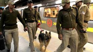 Security officials stand at AIIMS metro station. Security measures at the Delhi Metro and the IGI airport have been stepped up with the induction of over 600 fresh CISF personnel and commuters are being thoroughly frisked.(Representative Image/HT Photo) Security officials stand at AIIMS metro station. Security measures at the Delhi Metro and the IGI airport have been stepped up with the induction of over 600 fresh CISF personnel and commuters are being thoroughly frisked.(Representative Image/HT Photo)