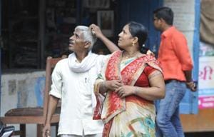 Curious onlookers outside infamous Deoria facility. The expose here sparked raids on shelter home across UP.(HT Photo) Curious onlookers outside infamous Deoria facility. The expose here sparked raids on shelter home across UP.(HT Photo)