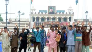 The released Pakistani fishermen at the Attari-Wagah border in Amritsar on Tuesday(HT Photo) The released Pakistani fishermen at the Attari-Wagah border in Amritsar on Tuesday(HT Photo)