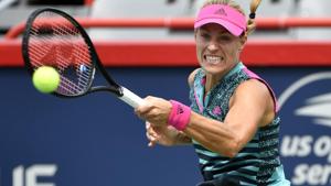 Angelique Kerber of Germany hits a forehand against Alize Cornet of France (not pictured). Angelique Kerber of Germany hits a forehand against Alize Cornet of France (not pictured).