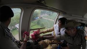 Along with ADGP(Meerut Zone) Prashant Kumar, Meerut commissioner Anita Meshram and other senior officials showered rose petals on Kanwariyas from a helicopter on Wednesday.(ANI Photo/Twitter) Along with ADGP(Meerut Zone) Prashant Kumar, Meerut commissioner Anita Meshram and other senior officials showered rose petals on Kanwariyas from a helicopter on Wednesday.(ANI Photo/Twitter)