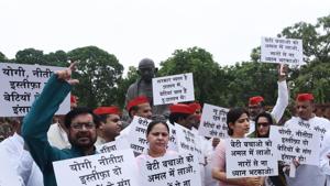 Political party leaders display placards and raise slogans during a protest over the recent incidents of Deoria and Muzaffarpur shelter homes, during Monsoon Session at the Parliament in New Delhi, on Monday.(Vipin Kumar/HT File photo) Political party leaders display placards and raise slogans during a protest over the recent incidents of Deoria and Muzaffarpur shelter homes, during Monsoon Session at the Parliament in New Delhi, on Monday.(Vipin Kumar/HT File photo)