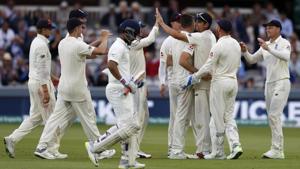 England's Alastair Cook (3R) celebrates with teammates after taking the catch to dismiss India's Ajinkya Rahane for 18 on the second day of the second Test cricket match between England and India at Lord's Cricket Ground in London on August 10, 2018.(AFP) England's Alastair Cook (3R) celebrates with teammates after taking the catch to dismiss India's Ajinkya Rahane for 18 on the second day of the second Test cricket match between England and India at Lord's Cricket Ground in London on August 10, 2018.(AFP)