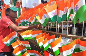 A vendor sells Tricolours ahead of the Independence Day function, in Guwahati on Saturday.(PTI Photo) A vendor sells Tricolours ahead of the Independence Day function, in Guwahati on Saturday.(PTI Photo)