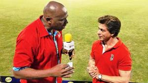 Shah Rukh Khan being interviewed by Trinidadian cricketer and commentator Ian Bishop at Park Oval, Port of Spain in Trinidad on Saturday. (Twitter) Shah Rukh Khan being interviewed by Trinidadian cricketer and commentator Ian Bishop at Park Oval, Port of Spain in Trinidad on Saturday. (Twitter)