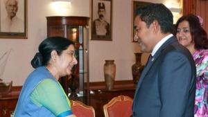Indian foreign minister Sushma Swaraj with Maldives' president Abdulla Yameen in Male, Maldives in October 2015. The Maldives asking India to take back its military helicopters and personnel deployed there reflects the country’s “increasing desire to rid itself of the excessive Indian influence”, Chinese state media said.(Representative Image/Reuters Photo) Indian foreign minister Sushma Swaraj with Maldives' president Abdulla Yameen in Male, Maldives in October 2015. The Maldives asking India to take back its military helicopters and personnel deployed there reflects the country’s “increasing desire to rid itself of the excessive Indian influence”, Chinese state media said.(Representative Image/Reuters Photo)