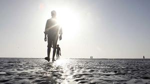 A man goes for a walk on Juhu beach, which is part of the Greater Mumbai territory.(Vidya Subramanian/HT photo)