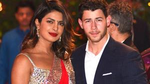 IPriyanka Chopra (L) accompanied by Nick Jonas arrive for the pre-engagement party of India's richest man and Reliance Industries Limited Chairman, Mukesh Ambani’s eldest son Akash Ambani and fiancee Shloka Mehta in Mumbai.(AFP) IPriyanka Chopra (L) accompanied by Nick Jonas arrive for the pre-engagement party of India's richest man and Reliance Industries Limited Chairman, Mukesh Ambani’s eldest son Akash Ambani and fiancee Shloka Mehta in Mumbai.(AFP)