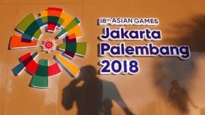 A man passes a signage at the media center ahead of the Asian Games in Palembang, South Sumatra, Indonesia August 16, 2018.(REUTERS) A man passes a signage at the media center ahead of the Asian Games in Palembang, South Sumatra, Indonesia August 16, 2018.(REUTERS)