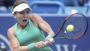 Mason: Simona Halep, of Romania, returns to Ajla Tomljanovic, of Australia, at the Western & Southern Open tennis tournament, Thursday, Aug. 16, 2018, in Mason, Ohio.(AP) Mason: Simona Halep, of Romania, returns to Ajla Tomljanovic, of Australia, at the Western & Southern Open tennis tournament, Thursday, Aug. 16, 2018, in Mason, Ohio.(AP)