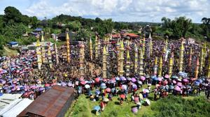 Tribesmen carry traditional chariots to mark the Behdienkhlam festival in Tuber village in Meghalaya on July 19, 2018. The festival is celebrated after sowing crops and prays for a good harvest.(AFP) Tribesmen carry traditional chariots to mark the Behdienkhlam festival in Tuber village in Meghalaya on July 19, 2018. The festival is celebrated after sowing crops and prays for a good harvest.(AFP)