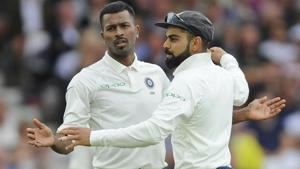 Indian cricket captain Virat Kohli, right, congratulates teammate Hardik Pandya for the dismissal of England's Adil Rashid.(AP) Indian cricket captain Virat Kohli, right, congratulates teammate Hardik Pandya for the dismissal of England's Adil Rashid.(AP)