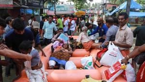 People evacuated by rescue workers in Paravoor in Ernakulam district, Kerala, on August 19, 2018.(AFP) People evacuated by rescue workers in Paravoor in Ernakulam district, Kerala, on August 19, 2018.(AFP)
