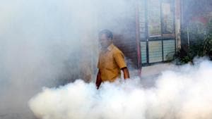 Ulhasnagar Municipal Corporation staff use a fogging machine to prevent the breeding of mosquitos in order to prevent spread of malaria, dengue and brain fever.(HT Photo) Ulhasnagar Municipal Corporation staff use a fogging machine to prevent the breeding of mosquitos in order to prevent spread of malaria, dengue and brain fever.(HT Photo)