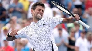 Novak Djokovic celebrates his win over Roger Federer during the Cincinnati Masters final.(AFP)