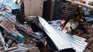 The three of the family - a woman and her two daughters - died when a wall of a government bungalow collapsed on their adjacent house in a slum of Kamal Nagar area about 4 am on Tuesday.(Mujeeb Faruqui/HT Photo) The three of the family - a woman and her two daughters - died when a wall of a government bungalow collapsed on their adjacent house in a slum of Kamal Nagar area about 4 am on Tuesday.(Mujeeb Faruqui/HT Photo)