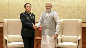 Prime Minister Narendra Modi shakes hands with defence minister of China, General Wei Fenghe during a meeting in New Delhi on August 21.(PTI Photo) Prime Minister Narendra Modi shakes hands with defence minister of China, General Wei Fenghe during a meeting in New Delhi on August 21.(PTI Photo)