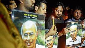 Supporters hold a rally on the eve of fifth death anniversary of Narendra Dabholkar in Pune on Sunday.(HT Photo) Supporters hold a rally on the eve of fifth death anniversary of Narendra Dabholkar in Pune on Sunday.(HT Photo)