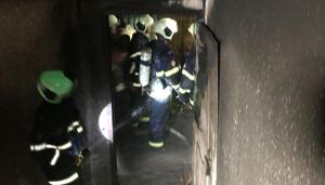 Firemen inside the Crystal Tower residential apartment in Mumbai’s Parel that caught fire on Wednesday.(Photo courtsey Fire department) Firemen inside the Crystal Tower residential apartment in Mumbai’s Parel that caught fire on Wednesday.(Photo courtsey Fire department)