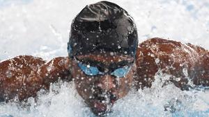 India's Sajan Prakash competes in a heat of the men’s 100m butterfly swimming event during the 2018 Asian Games in Jakarta on August 22, 2018.(AFP) India's Sajan Prakash competes in a heat of the men’s 100m butterfly swimming event during the 2018 Asian Games in Jakarta on August 22, 2018.(AFP)