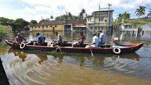 Local fisherman help flood victims in the outskirts of Alappuzha district, Kerala.(Raj K Raj/HT Photo) Local fisherman help flood victims in the outskirts of Alappuzha district, Kerala.(Raj K Raj/HT Photo)