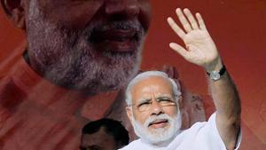 Prime Minister Narendra Modi waves to the gathering during his visit to Gujarat's Somnath Temple.(PTI File Photo) Prime Minister Narendra Modi waves to the gathering during his visit to Gujarat's Somnath Temple.(PTI File Photo)