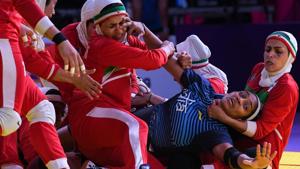 Iran's players tackle India's Randeep Kaur Khehra (2nd R) during the women's team kabaddi finals match between India and Iran at the 2018 Asian Games in Jakarta on August 24, 2018.(AFP) Iran's players tackle India's Randeep Kaur Khehra (2nd R) during the women's team kabaddi finals match between India and Iran at the 2018 Asian Games in Jakarta on August 24, 2018.(AFP)