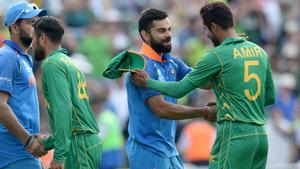 LONDON, ENGLAND - JUNE 18 : Mohammad Amir of Pakistan shakes hands with Virat Kohli of India after the ICC Champions Trophy final match between India and Pakistan at the Kia Oval cricket ground on June 18, 2017 in London, England.(Getty Images) LONDON, ENGLAND - JUNE 18 : Mohammad Amir of Pakistan shakes hands with Virat Kohli of India after the ICC Champions Trophy final match between India and Pakistan at the Kia Oval cricket ground on June 18, 2017 in London, England.(Getty Images)
