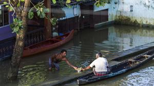 A view of submerged houses because of flood at Alappuzha district in Kerala. Many have joined in for relief operations in the flood-hit state, including Congress veteran AK Antony’s son Anil.(Bloomberg) A view of submerged houses because of flood at Alappuzha district in Kerala. Many have joined in for relief operations in the flood-hit state, including Congress veteran AK Antony’s son Anil.(Bloomberg)