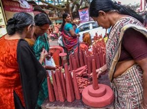 Kochi: A vendor selling “Thrikkakara Appan”, the most important of Onam celebration in Kochi, August 24(PTI) Kochi: A vendor selling “Thrikkakara Appan”, the most important of Onam celebration in Kochi, August 24(PTI)