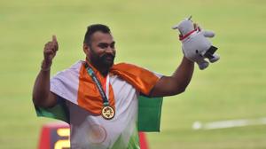 India's Tajinderpal Singh Toor celebrates after receiving his gold medal for the men's shot put during the athletics competition at the 18th Asian Games in Jakarta, Indonesia on August 25, 2018.(PTI) India's Tajinderpal Singh Toor celebrates after receiving his gold medal for the men's shot put during the athletics competition at the 18th Asian Games in Jakarta, Indonesia on August 25, 2018.(PTI)