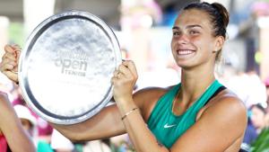 Aryna Sabalenka of Belarus celebrates with her trophy after defeating Carla Suarez Navarro of Spain in Conneticut.(AFP) Aryna Sabalenka of Belarus celebrates with her trophy after defeating Carla Suarez Navarro of Spain in Conneticut.(AFP)