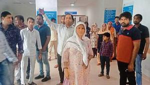 The kin of Vinod Bhati, who was attacked on Saturday night by four unidentified men, waiting outside the ICU where is admitted. The kin of Vinod Bhati, who was attacked on Saturday night by four unidentified men, waiting outside the ICU where is admitted.