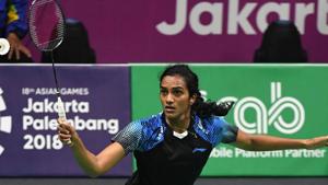 PV Sindhu hits a shot against Japan’s Akane Yamaguchi in their women's singles semi-final badminton match at the 2018 Asian Games in Jakarta on August 27, 2018.(AFP) PV Sindhu hits a shot against Japan’s Akane Yamaguchi in their women's singles semi-final badminton match at the 2018 Asian Games in Jakarta on August 27, 2018.(AFP)