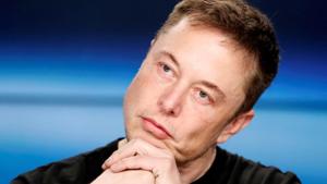 Elon Musk listens at a press conference in Florida.(Reuters File Photo) Elon Musk listens at a press conference in Florida.(Reuters File Photo)