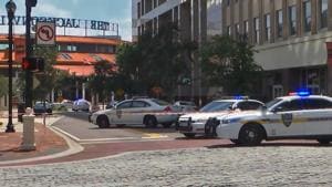 This handout image distributed courtesy of WJXT, a local Jacksonville television station, shows police cars blocking a street leading to the Jacksonville Landing area in downtown Jacksonville, Florida.(AFP Photo) This handout image distributed courtesy of WJXT, a local Jacksonville television station, shows police cars blocking a street leading to the Jacksonville Landing area in downtown Jacksonville, Florida.(AFP Photo)
