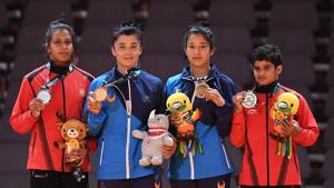 Silver medallist India's Pincky Balhara (L) and bronze medallists Uzbekistan's Oysuluv Abdumajidova (2R) and India's Malaprabha Yallapa Jadhav pose during the medal ceremony for the women's -52kg kurash.(AFP) Silver medallist India's Pincky Balhara (L) and bronze medallists Uzbekistan's Oysuluv Abdumajidova (2R) and India's Malaprabha Yallapa Jadhav pose during the medal ceremony for the women's -52kg kurash.(AFP)