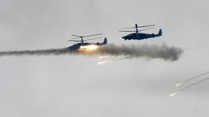 Military helicopters fire during the Zapad (West) 2017 Russia-Belarus military exercises at the Borisovsky range in Borisov, Belarus, Wednesday, Sept. 20, 2017.(AP File Photo) Military helicopters fire during the Zapad (West) 2017 Russia-Belarus military exercises at the Borisovsky range in Borisov, Belarus, Wednesday, Sept. 20, 2017.(AP File Photo)