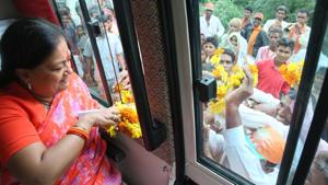 CM Vasundhara Raje greets people as her Gaurav Yatra passes through villages in Dungarpur.(HT File Photo) CM Vasundhara Raje greets people as her Gaurav Yatra passes through villages in Dungarpur.(HT File Photo)